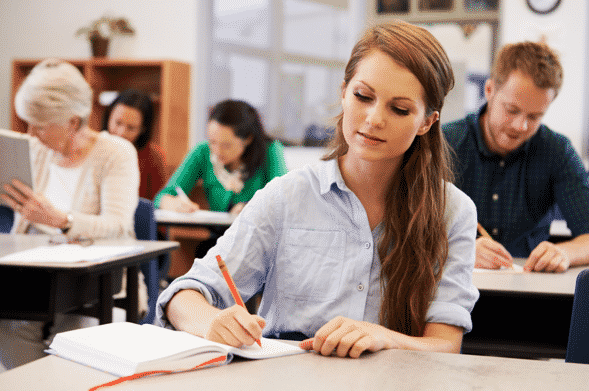 Students Taking Notes In A Classroom